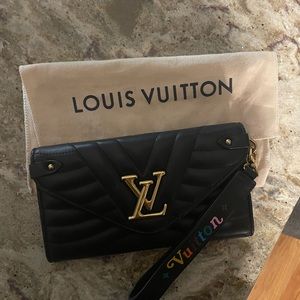 Authentic Louis Vuitton wave clutch